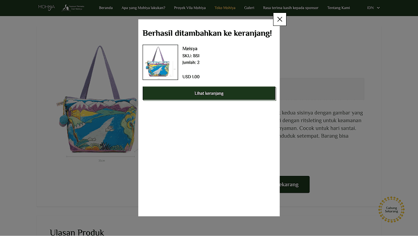 Confirmation dialog reading Berhasil ditambahkan ke keranjang, summarising the product just added